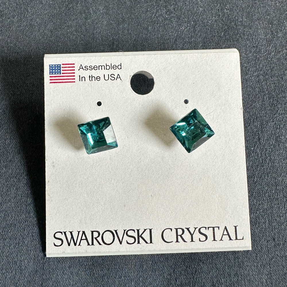 Brand new, never worn Swarovski Crystal stud earrings.